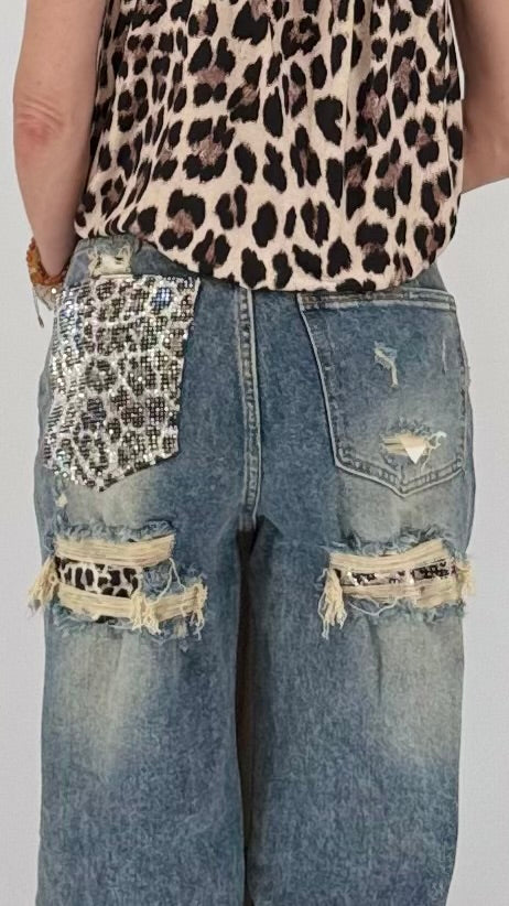 Jeans mit auffälligen Patchwork- und Leo-Details