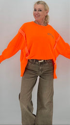 Oversize Sweatshirt Neon-Orange mit Leo-Print "SELF"
