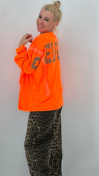 Oversize Sweatshirt Neon-Orange mit Leo-Print "SELF"
