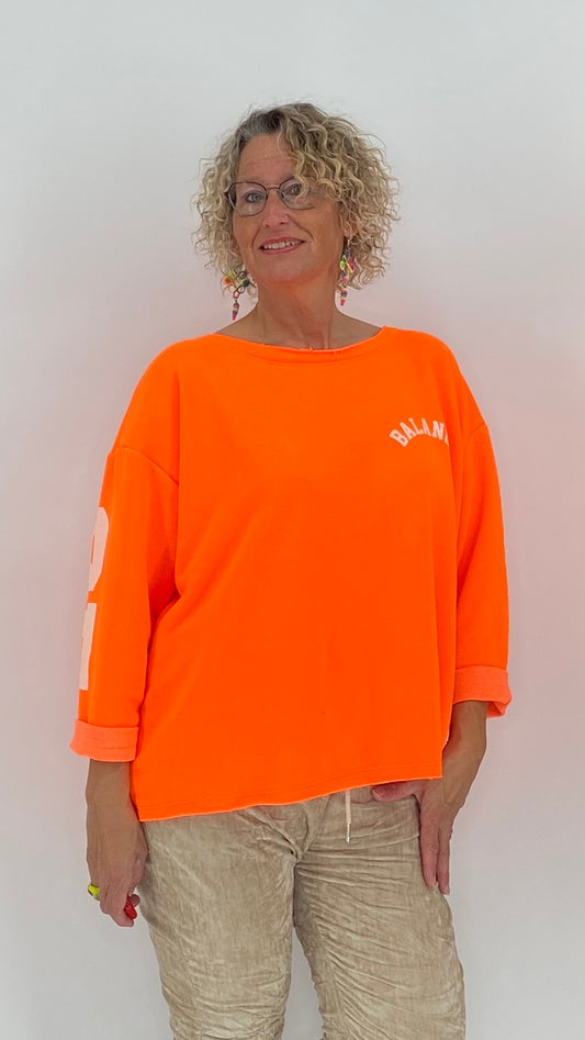 Sweatshirt in orange, balance