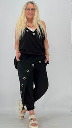 Lässige  Hose in Pink und Schwarz mit Ösen