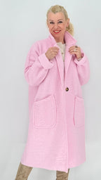 Langer Flausch-Strickmantel in Bouclé-Optik mit Reverskragen in Rosa