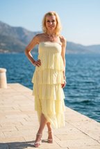 Volant-Maxikleid oder Rock in Pastellgelb und Creme