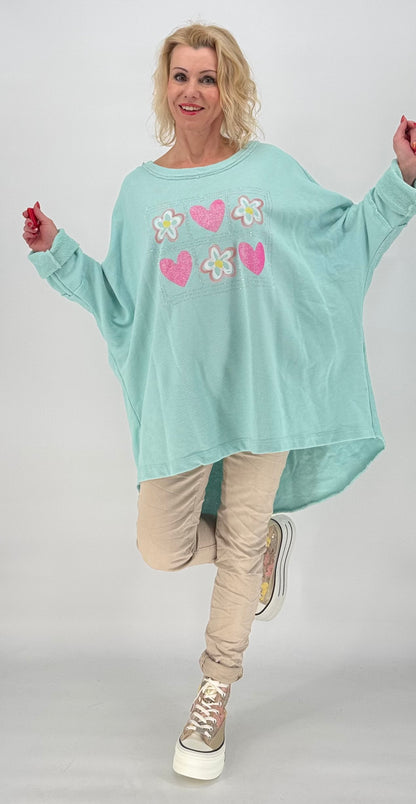 Sweatshirt in helltürkis "Blumen uhd Herz"