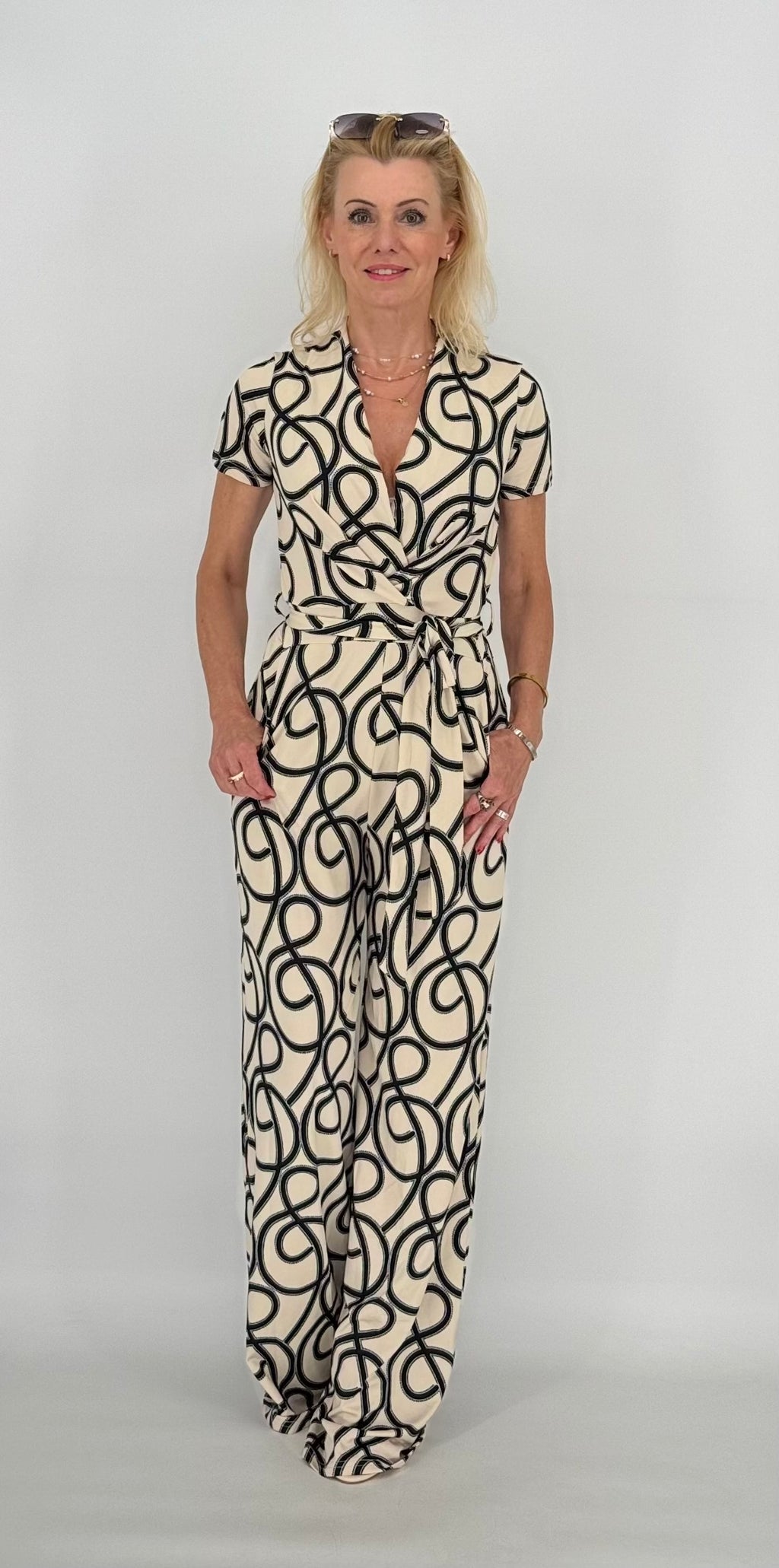 Jumpsuit, beige/schwarz