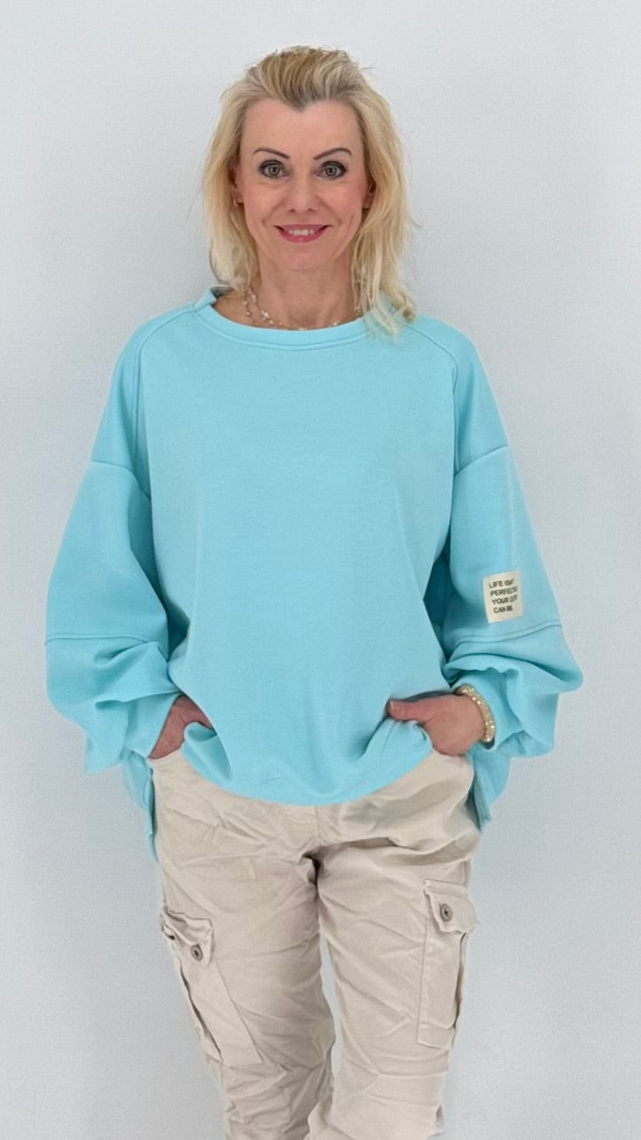 Sweatshirt in türkis/blau