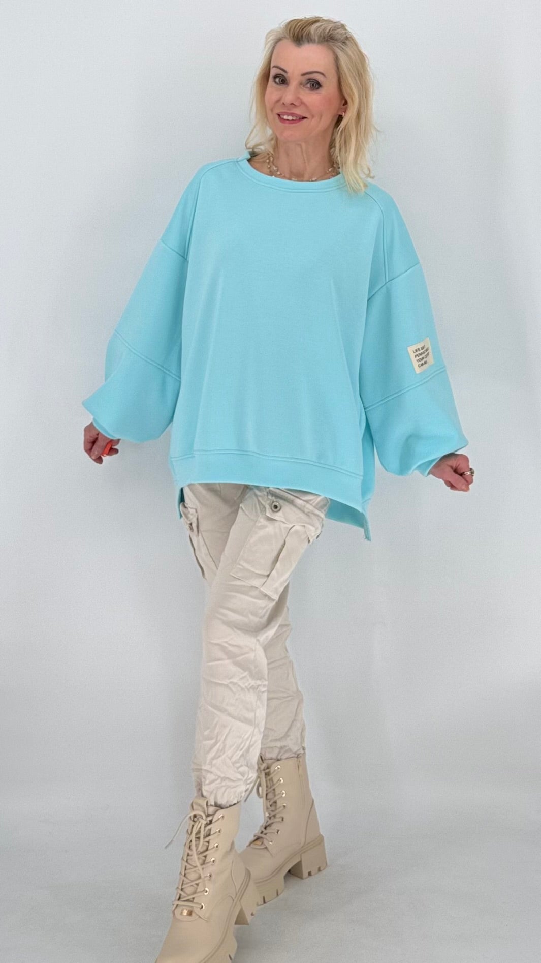 Sweatshirt in türkis/blau